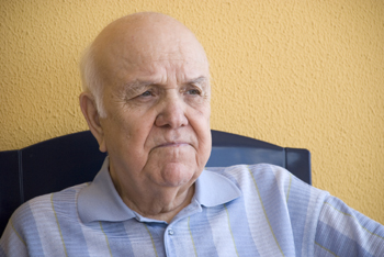 pensive elderly man